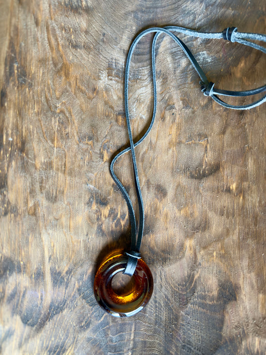 Brown Glass bottle necklace with black leather